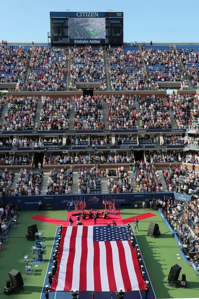 US Marine Corps unfurling American Flag during the opening ceremony of the US Open 2014 women final