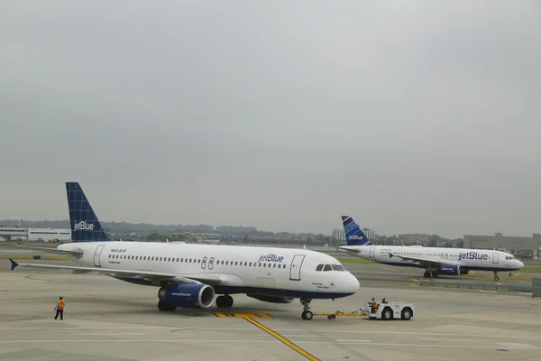 JetBlue Airbus aircrafts taxing at John F Kennedy International Airport in New York