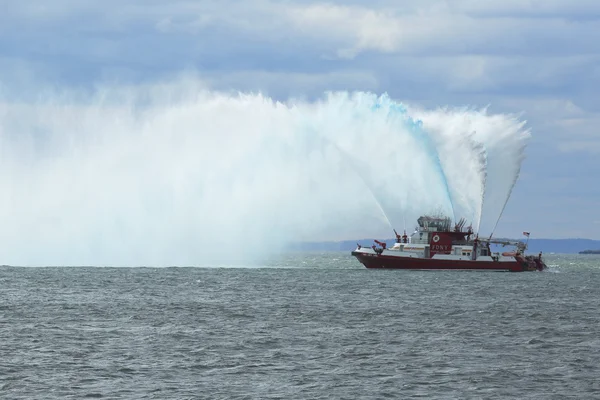 FDNY Fireboat sprays water into the air to celebrate the start of New York City Marathon 2014
