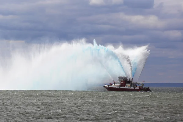 FDNY Fireboat sprays water into the air to celebrate the start of New York City Marathon 2014