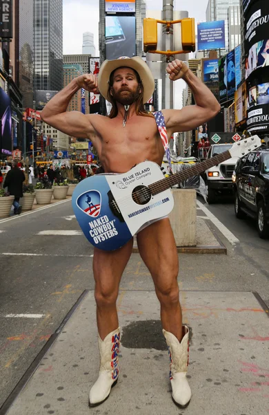 Famous Naked Cowboy posing at the Times Square in Manhattan