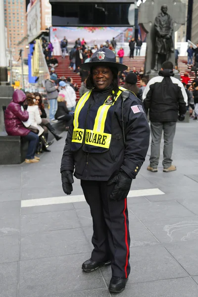 Unidentified security officer providing security at Times Square area in Midtown Manhattan