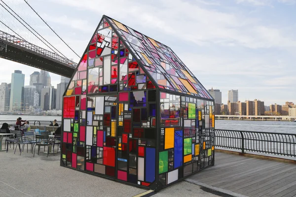 Stained glass sculpture by Tom Fruin under Brooklyn Bridge