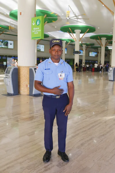 CESAC officer providing security at Punta Cana Airport