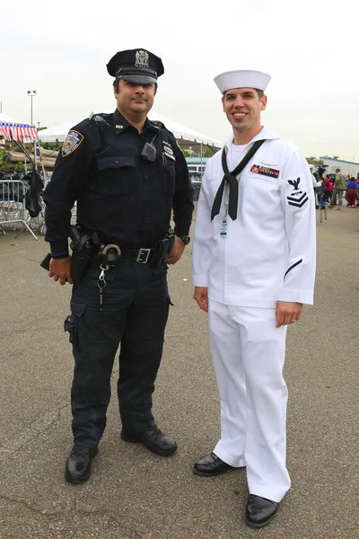 NYPD police officer and US sailor during Fleet Week 2015 in New York