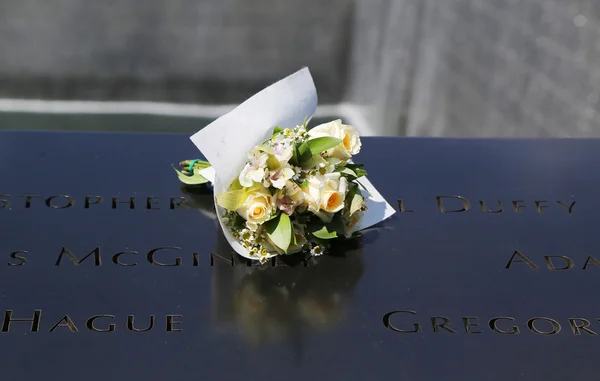 Flowers left at the National September 11  Memorial at Ground Zero in Lower Manhattan