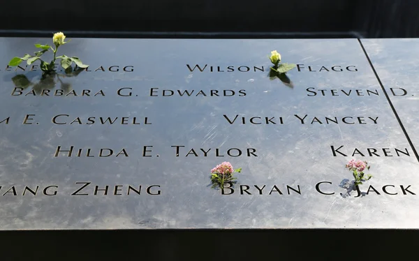 Flower left at the National September 11  Memorial at Ground Zero in Lower Manhattan
