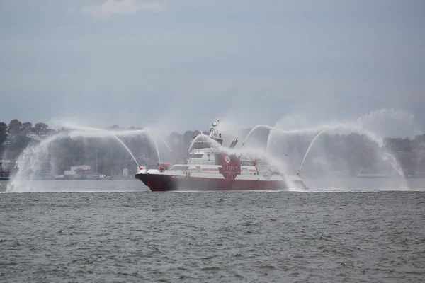 FDNY fire boat sprays water into the air to celebrate the start of New York City Marathon 2015