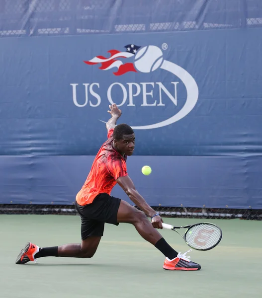 Professional tennis player Frances Tiafoe of United States in action during his first round match at US Open 2015