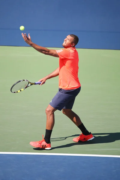 Professional tennis player Jo-Wilfried Tsonga of France in action during his round four match at US Open 2015