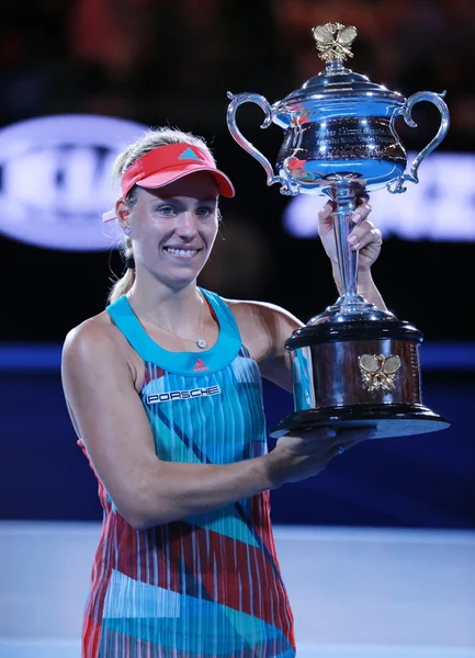 Grand Slam champion Angelique Kerber of Germany holding Australian Open trophy during trophy presentation after victory at Australian Open 2016