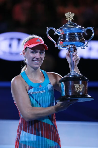 Grand Slam champion Angelique Kerber of Germany holding Australian Open trophy during trophy presentation after victory at Australian Open 2016