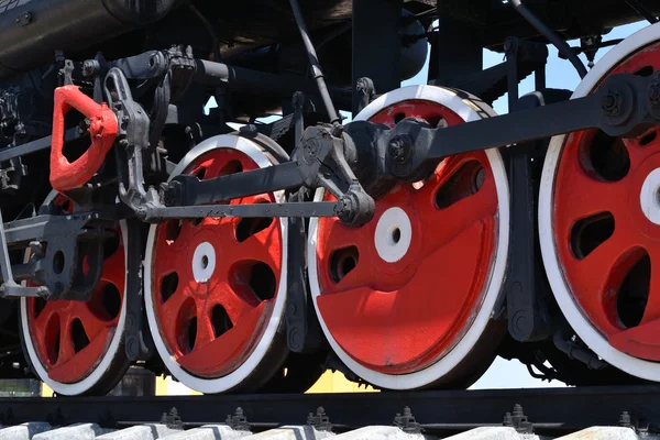 The wheels of the locomotive.
