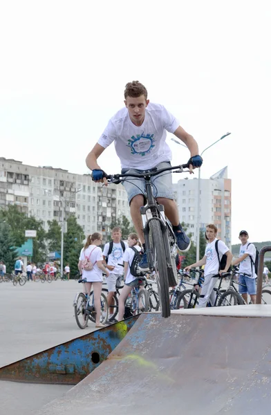 The young man on a bicycle stunts. Editorial image.