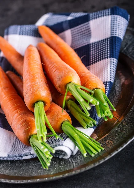 Carrot. Fresh Carrots bunch. Baby carrots. Raw fresh organic orange carrots. Healthy vegan vegetable food