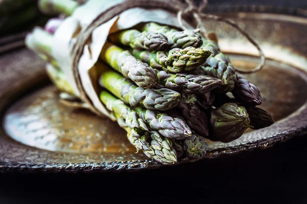 Asparagus. Raw asparagus. Fresh Asparagus.Green Asparagus. Tied asparagus in other positions