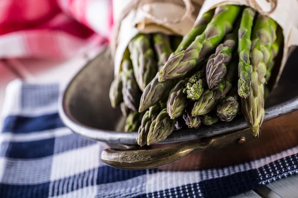 Asparagus. Raw asparagus. Fresh Asparagus.Green Asparagus. Tied asparagus in other positions