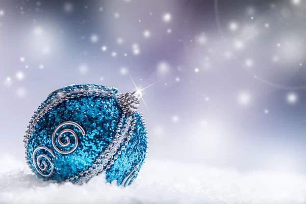 Christmas. Christmas blue balls  snow and space abstract background