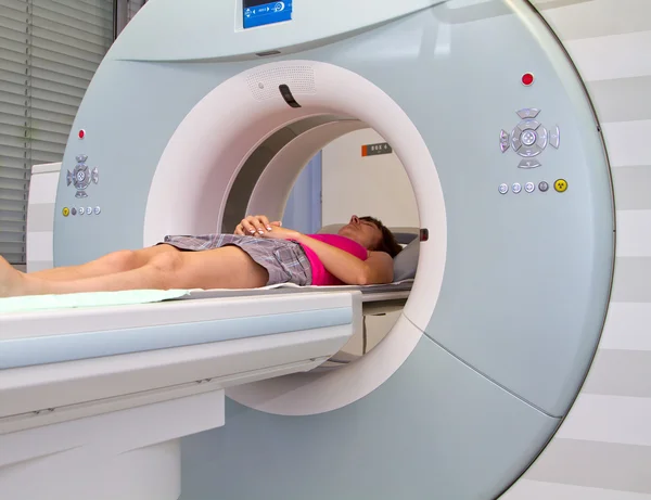Woman as a patient being investigated for magnetic resonance scanner.