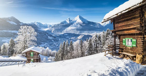Winter wonderland in the Alps with traditional mountain chalets