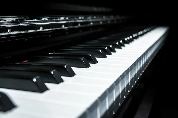 Closeup view of classical piano keys with modern black and white style