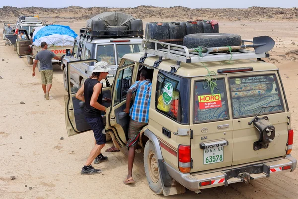 Caravan of all-terrain cars lost in the desert. Danakil-Ethiopia. 0185