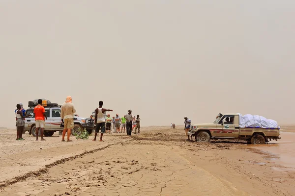 Caravan of 4wd cars-troubles crossing the flooded desert. Danakil-Ethiopia. 0251