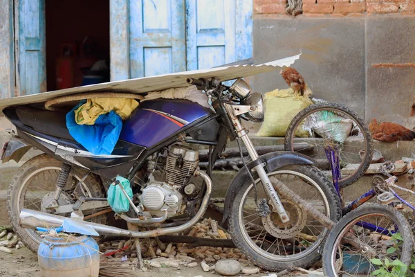 Motorbike among bicycle parts. Thrangu Tashi Yangtse monastery-Namo Buddha-Nepal. 1020
