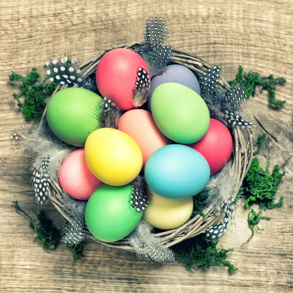 Easter eggs with feather decoration vintage toned