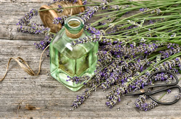 Herbal lavender oil with flowers. Alternative medicine