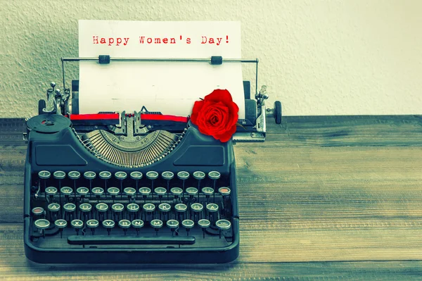 Text Happy Women's Day in  typewriter