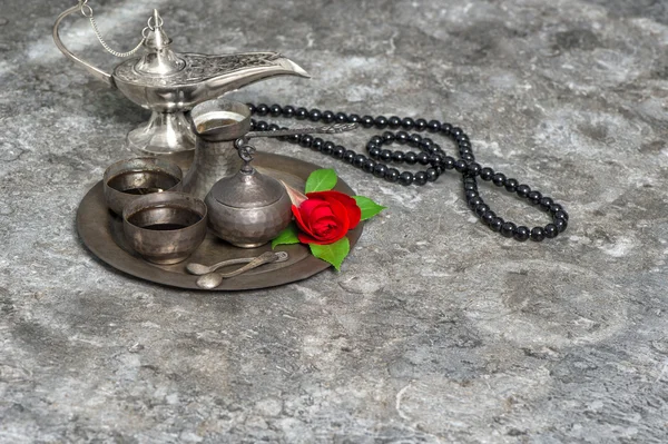 Moroccan coffee, rose flower, arabian lantern, rosary. Islamic h