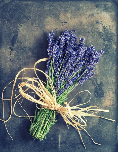 Lavender flowers with shabby chic decorations. Fresh blossoms