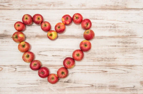 Red apples heart shape