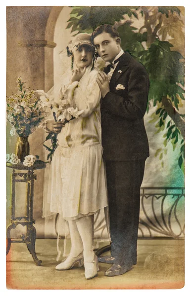 Young couple wearing vintage clothing. Old picture