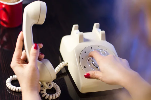 Woman phone dialing