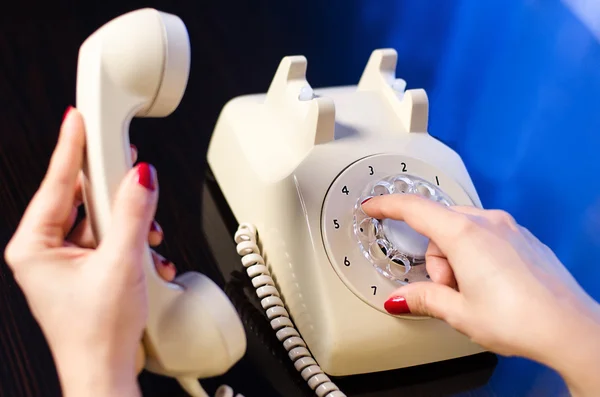 Woman phone dialing