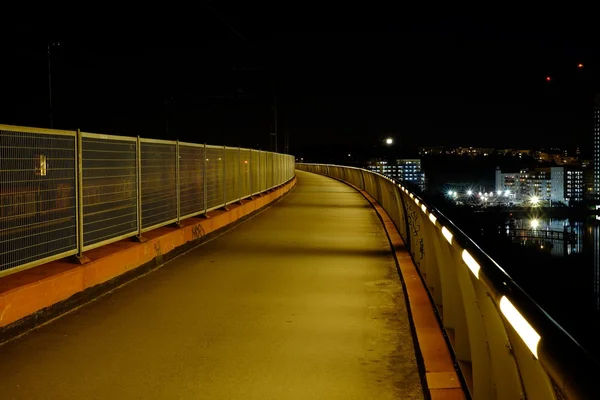 Night lane on the bridge