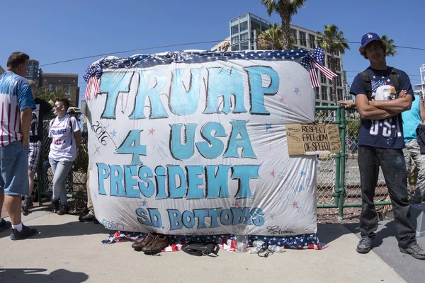 Trump supporters with Trump 4 USA President banner