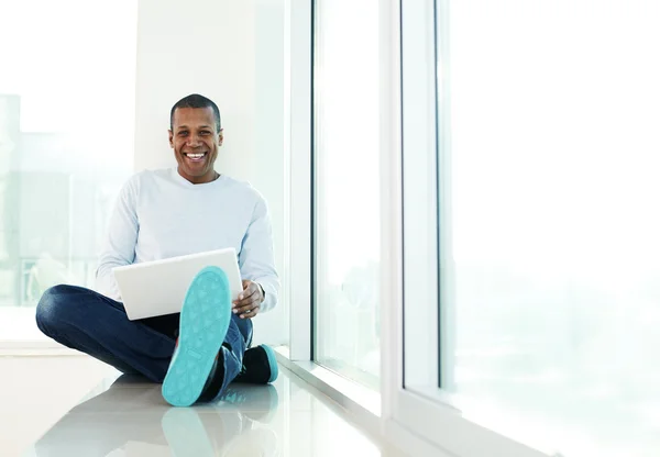 Happy man with laptop