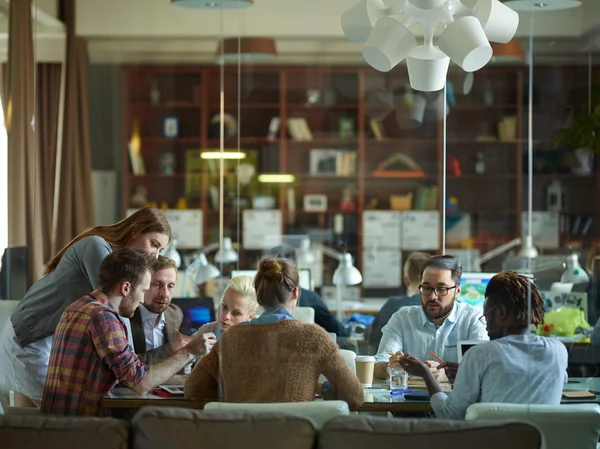 Young employees at meeting