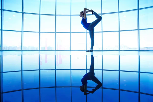 Woman doing balance exercise