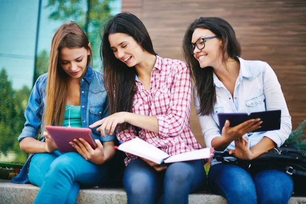 Teenage girls using tablet pc