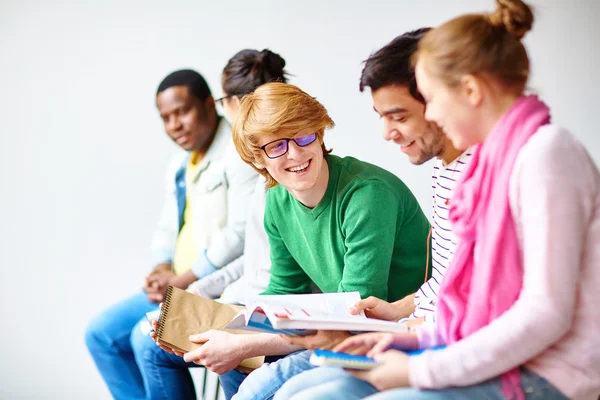 Group of college students sitting together