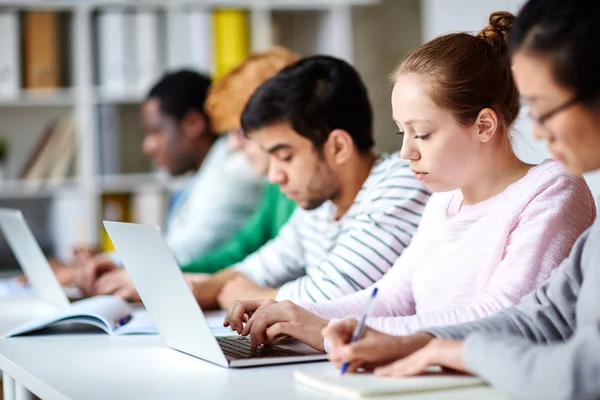 Female student sitting at desk