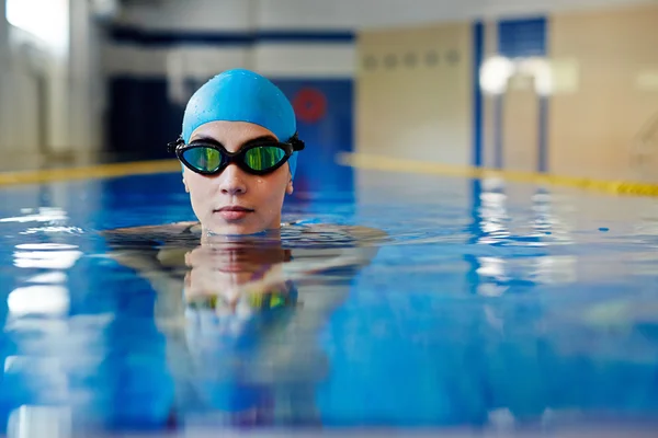 Swimmer in rubber cap