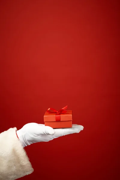 Santa Claus  hand with package