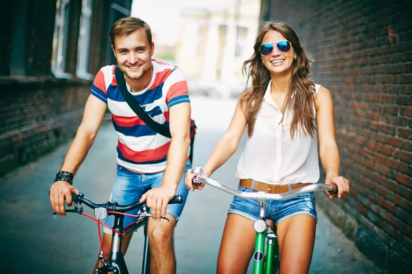 Couple on bicycles