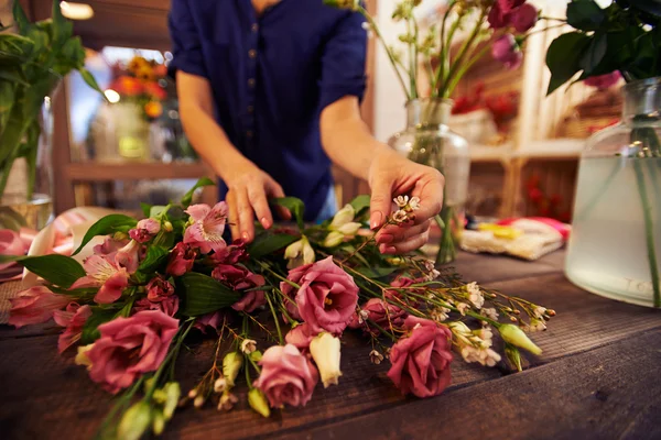 Florist working with flowers