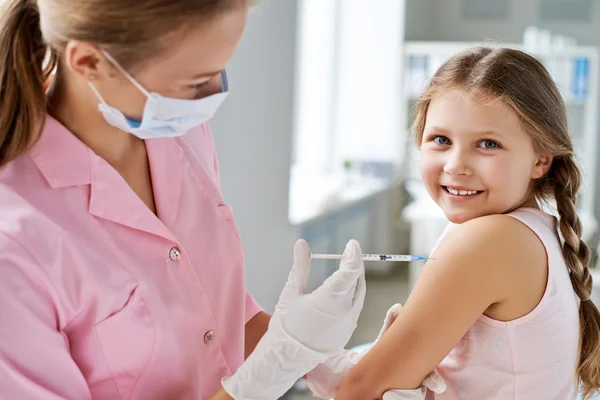 Nurse making injection